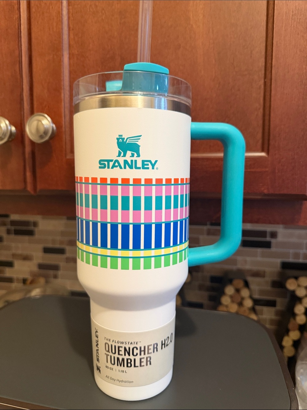 Stanley White Tumbler with Teal Handle and Multicolor Stripe Accents